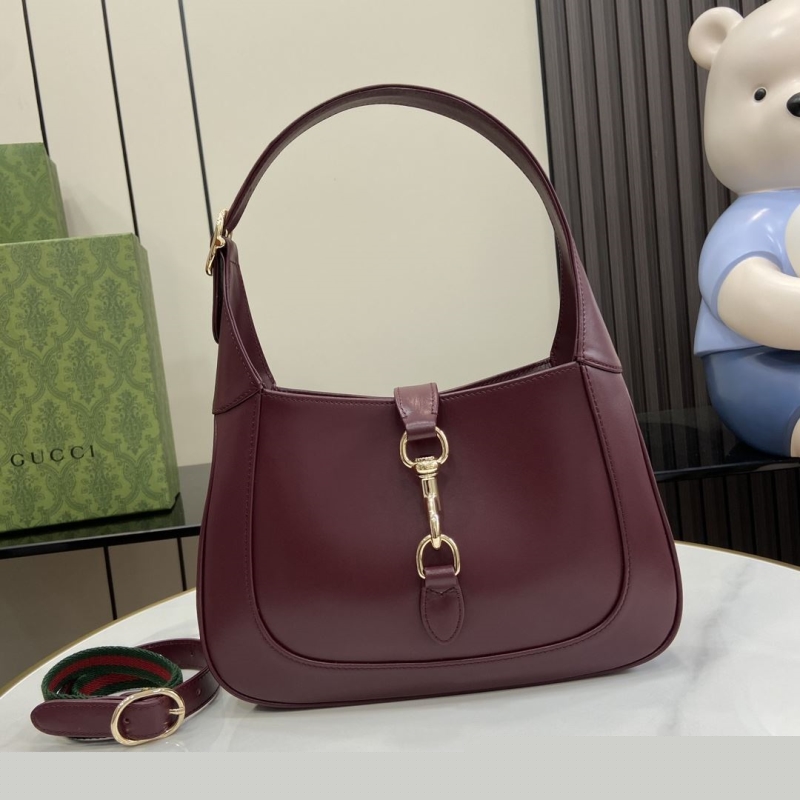 G*u*i top handle bags